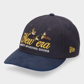 New Era navy cotton cap with gold embroidered ducks and Quality Sporting Goods script, curved peak with contrast logo tab