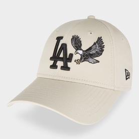 New Era beige baseball cap with embroidered LA Dodgers logo and bald eagle motif, curved brim, side brand flag