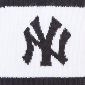 New Era NY Yankees socks in white with black NY logo and stripe detail, 92% cotton blend
