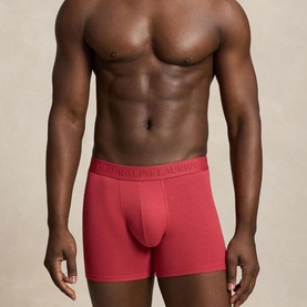 Model wearing red Polo Ralph Lauren boxer briefs with branded elastic waistband.
