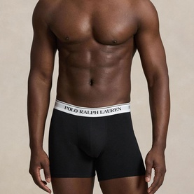 Model wearing Polo Ralph Lauren black boxer briefs with white logo waistband