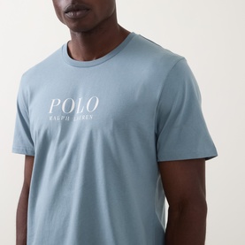 Model wearing Ralph Lauren Script Logo Jersey Sleep Shirt in Cool Grey Blue, ribbed crew neck, short sleeves, Polo logo chest print.