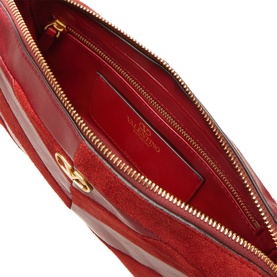 Valentino blood red leather shoulder bag interior view, gold-tone zip and hardware, red suede lining with brand logo detail