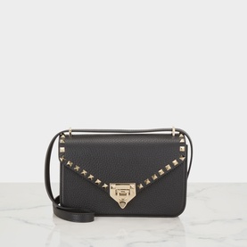 Valentino Rockstud nero leather shoulder bag with gold stud trim, flap closure, and slim crossbody strap