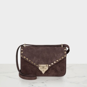 Valentino Rockstud Small Suede Shoulder Bag in Oak Brown with gold-tone stud trim, flap clasp closure, and adjustable crossbody strap