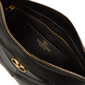 Valentino Nero nappa leather shoulder bag interior, showing gold-tone zip, VLogo hardware detail and branded lining