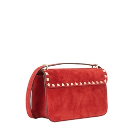 Valentino Garavani red suede shoulder bag with white rockstud trim, gold-tone top handle and detachable crossbody strap