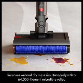 Cordless vacuum cleaner floor head with blue 64,000-filament microfibre roller cleaning wet and dry mess on hard floor