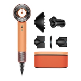 Dyson Supersonic hair dryer in copper and black with five attachments and matching orange storage case
