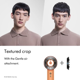 Dyson hair dryer in orange and gold with Gentle air attachment, styled on male model showing textured crop hairstyle result