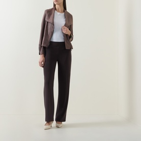 Model wearing Joseph Ribkoff Mink jacket with open front, styled with dark straight-leg trousers, white top and cream heels.