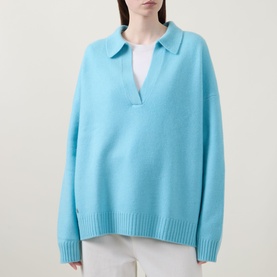Model wearing Lucy Nagle The Cashmere Collar Sweater in Bambino blue, with notched neckline, flat collar and dropped shoulders, styled with white