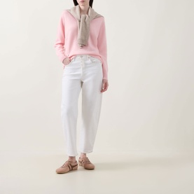 Model wearing Lucy Nagle The Elevated Cashmere Sweater in Crystal Rose, styled with white wide-leg jeans, grey scarf and nude flat shoes