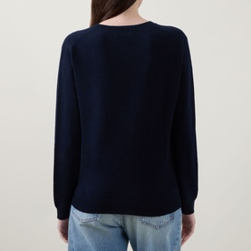 Model wearing Lucy Nagle The Everyday Cashmere Sweater in Midnight Slate, back view, crew neck, long sleeves with ribbed trims, styled with