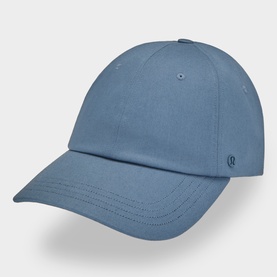 Lululemon Steel Blue baseball cap with structured crown, curved brim, and tonal logo badge on side.