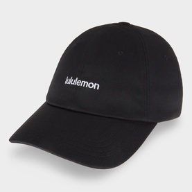 Lululemon black baseball cap with embroidered white logo on front panel and curved brim