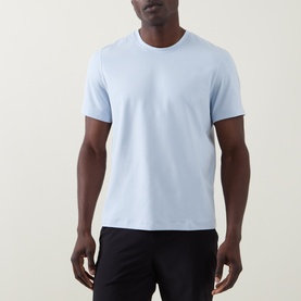 Model wearing Lululemon Starch Blue crew neck t-shirt, styled with black trousers