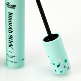 The Smooth Company Smooth Stick&trade; Island Edition hair taming wand in mint green with star print cap and black applicator brush tip