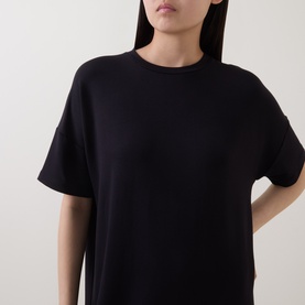 Model wearing Marc O Polo Solid Sweatshirt Dress in black, cropped view showing round neckline, dropped shoulders and short sleeves