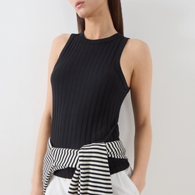Model wearing Marc O Polo black ribbed sleeveless top with crew neck, styled with striped waistband bottoms.