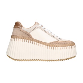 Cream and tan leather platform trainers with whipstitch detailing, chunky ribbed white platform sole and gold-tone accents