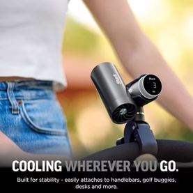 Compact grey personal fan mounted on a handlebar outdoors, with text overlay reading Cooling Wherever You Go.