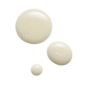 Est&eacute;e Lauder serum texture swatch showing three cream-white drops of varying sizes on a white background