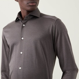 Model wearing Eton Fid De Scozia Single-Cuff Shirt in dark brown, featuring pointed collar, front button fastening and long sleeves