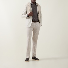 Model wearing Eton Fid De Scozia Single-Cuff Shirt in dark brown, styled with light beige blazer and matching trousers, navy espadrilles