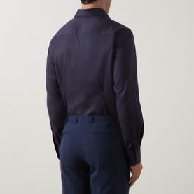 Model wearing Eton Navy Geo Trim Single Cuff Regular shirt, rear view, styled with navy tailored trousers