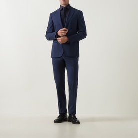 Model wearing Eton Navy Geo Trim Single Cuff Regular shirt, styled with a navy suit and black dress shoes.