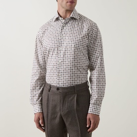 Model wearing Eton Brown Single Cuff Regular formal shirt with geometric print pattern, styled with brown trousers.