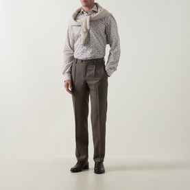 Model wearing Eton Brown Single Cuff Regular cotton shirt with geometric print, styled with taupe scarf and dark brown tailored trousers.