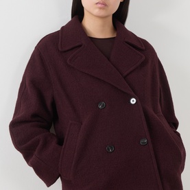 Model wearing Marc O Polo Black Cherry wool jacket, double-breasted with wide lapels and front pockets
