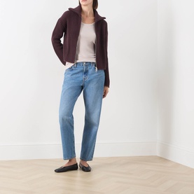 Model wearing Marc O Polo Natural T-Shirt, styled with burgundy zip-up hoodie and light blue straight-leg jeans.