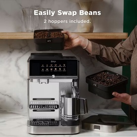 Ninja AutoBarista Pro Coffee Machine with two removable bean hoppers being swapped, demonstrating dual-hopper functionality