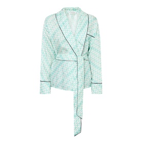 Victoria Beckham Alba Silk Printed Wrap Blouse in blue with geometric print, contrast black piping, shawl collar, and self-tie waist belt