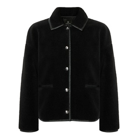 Anine Bing black faux shearling jacket with silver snap buttons, contrast trim, and front patch pockets