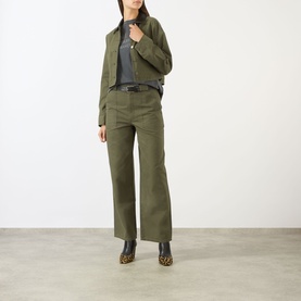 Model wearing Anine Bing Yuma Cropped Jacket in Army Green with matching wide-leg trousers, grey top, and leopard-print boots.