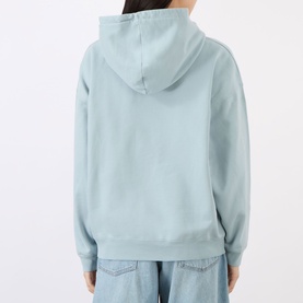 Model wearing Anine Bing Harvey Logo Drawstring Hoodie in blue, rear view, styled with light-wash wide-leg jeans