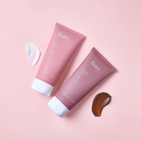 Bare by Vogue Gradual Tan self-tan lotion in pink tube, reverse side showing barcode and product information text