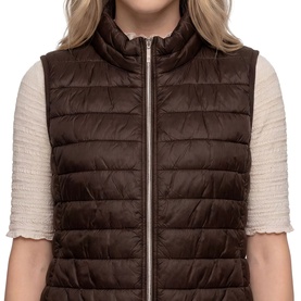 Model wearing Betty Barclay Quilted Zipped Gilet in Muskat, with stand-up collar and two-way zip, styled over a cream knit top.