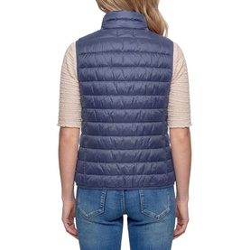 Model wearing Betty Barclay Quilted Zipped Gilet in Blue Horizon, rear view, styled with a cream top and blue jeans.