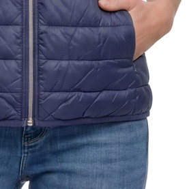 Model wearing Betty Barclay Quilted Zipped Gilet in Blue Horizon, close-up of silver two-way zip and slit pocket detail, styled with blue jeans