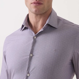Model wearing Calvin Klein Violet Single Cuff Slim formal shirt, close-up showing spread collar and tonal dot pattern