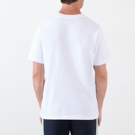 Model wearing Casablanca Diamond Logo T-Shirt in white, rear view showing round neckline, short sleeves and straight hemline. Styled with navy
