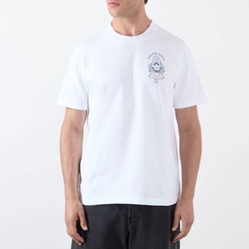 Model wearing Casablanca Classic Logo Graphic T-Shirt in white with Hotel Emblem chest graphic print, round neck, short sleeves, styled with dark