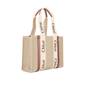 Chloe Woody Tote in white brown canvas with signature logo ribbon straps in blush and brown tones, gold-tone hardware detail