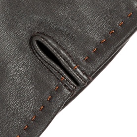 Dents brown leather gloves close-up showing contrast tan stitch detail and tab vent at wrist