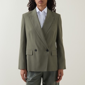 Model wearing Hugo Boss khaki green double-breasted blazer with notch lapels and flap pockets, styled with white shirt and grey trousers
